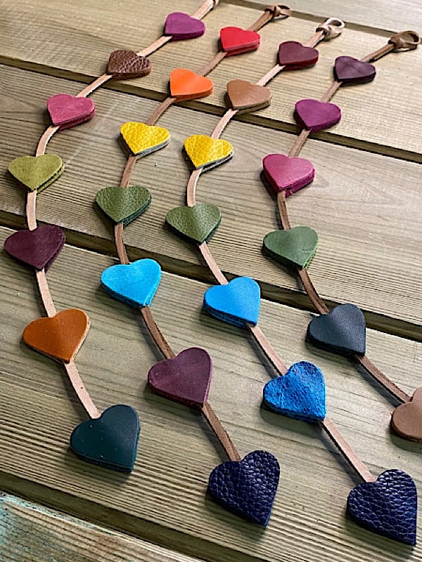 Coloured leather hearts on a string
